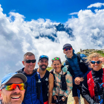 Running on the trails around Chamonix. Here we took a selfie above the clouds with our guide.&nbsp;
